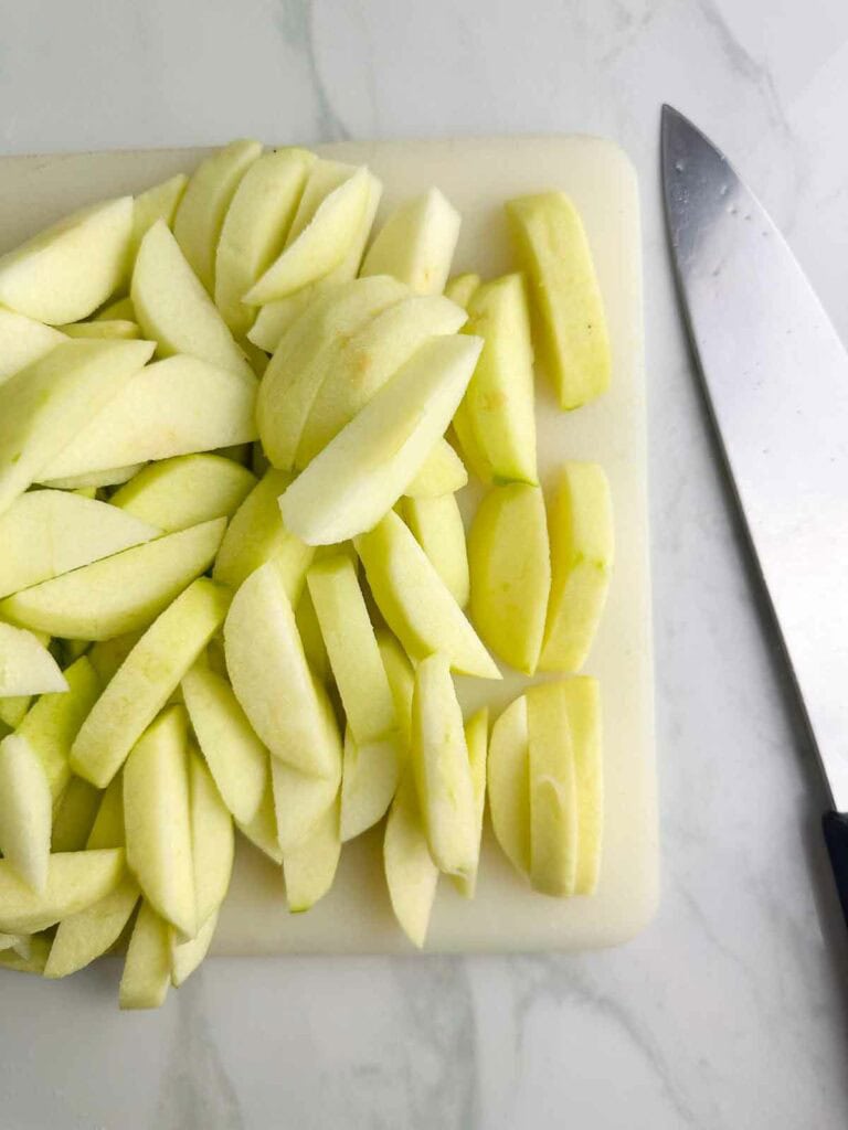 Peeled apple slices for apple pie filling.