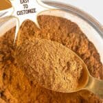 Apple pie spice in a bowl and spoon. Text reads: apple pie spice recipe, easy to customize, www.seasonedsprinkles.com