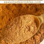 Apple pie spice in a spoon and bowl. Text reads: homemade apple pie spice, seasonedsprinkles.com