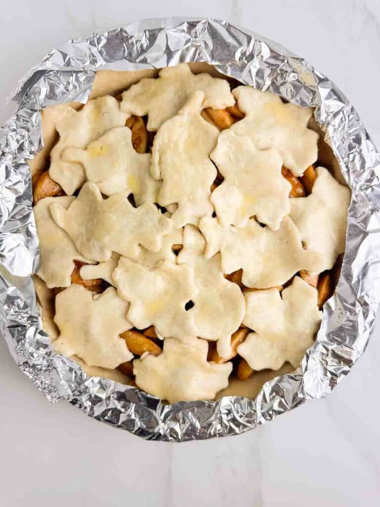 Before baking, add aluminum foil to th edges to help keep them from burning too quickly.