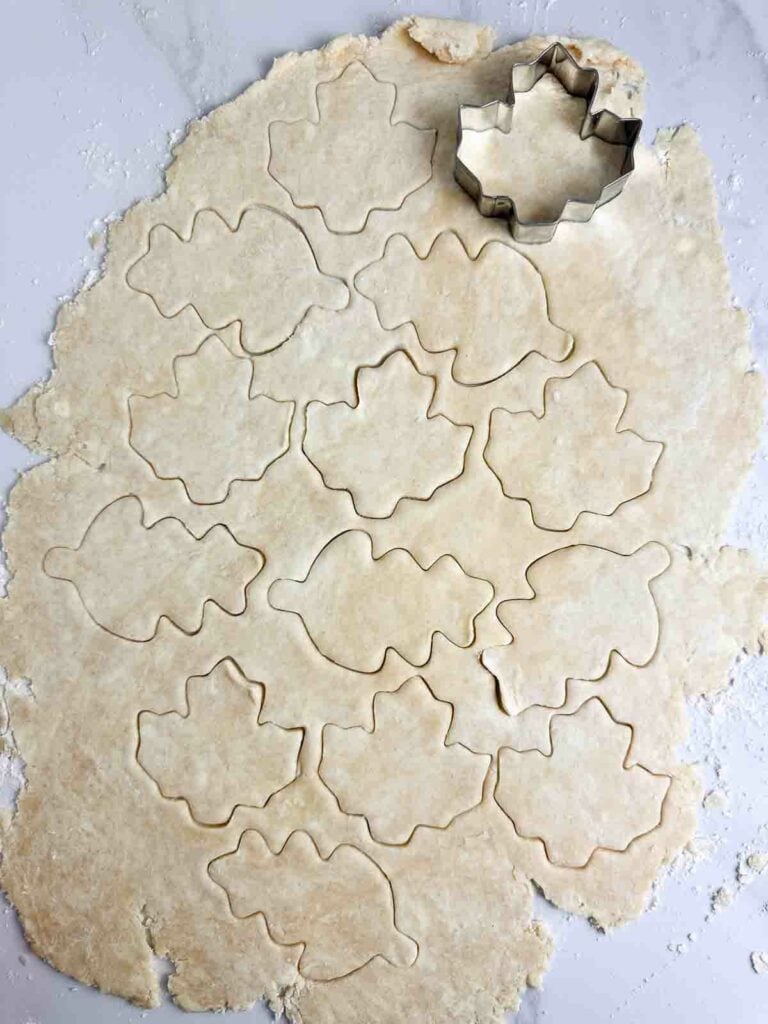Using homemade pie crust to make fun leaf shapes.