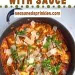 a photo of a skillet of ravioli with sauce set into a decorative text box that reads "ravioli with sauce seasonedsprinkles.com"