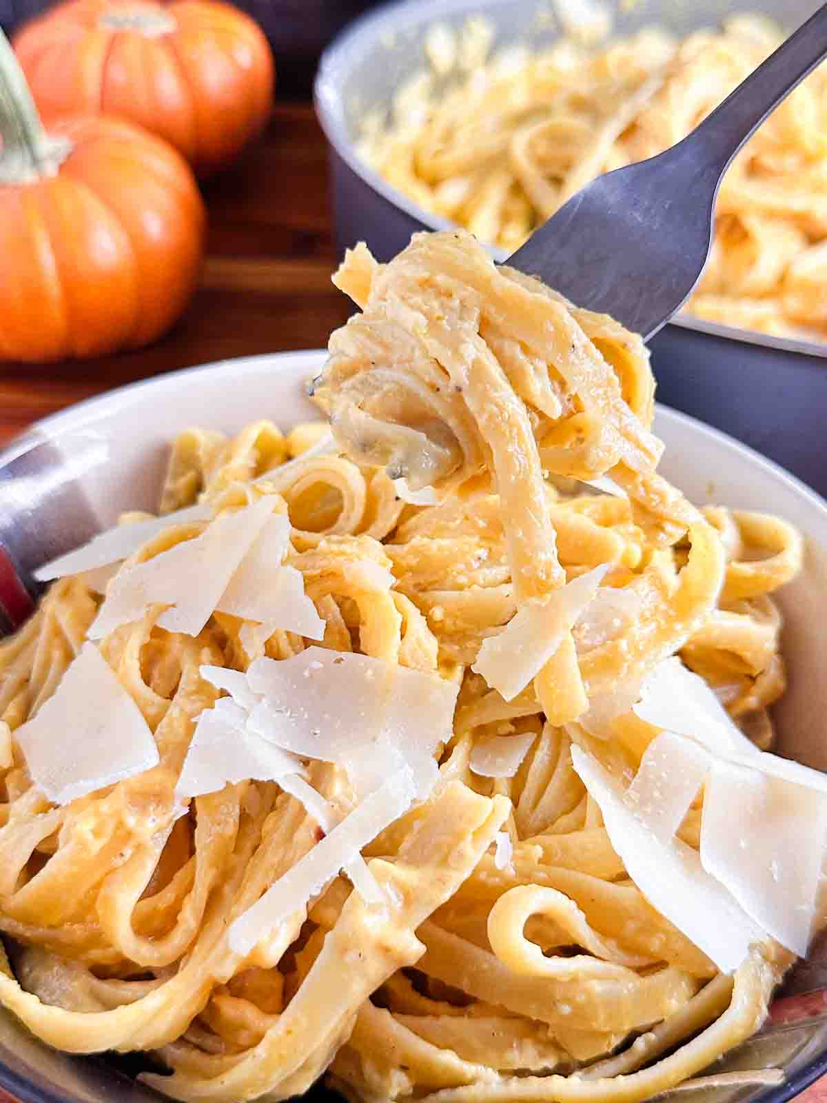 Getting a fork full of pumpkin pasta.