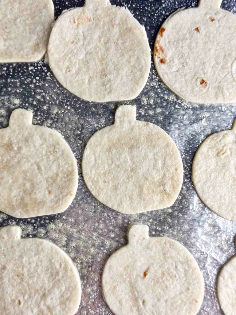 Halloween tortilla chips ready to go into the oven