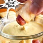 Pigs in a blanket getting dunked in mustard, text reads: pigs in a blanket with crescent dough, www.seasonedsprinkles.com.