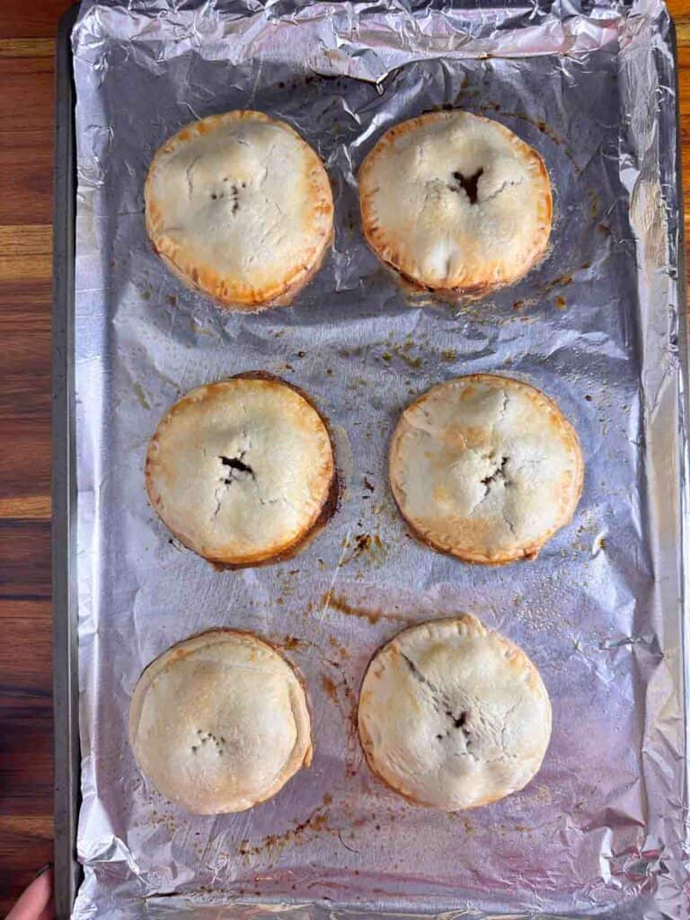 Mini apple pies fresh from the oven.