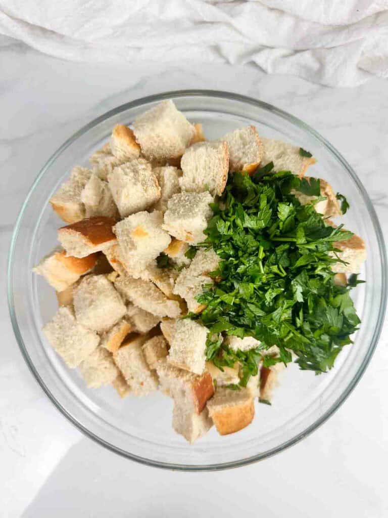 Sourdough chunks and parsley ready for the stuffing.