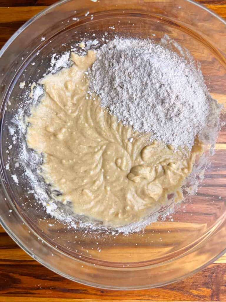 Flour added to cranberry orange bread batter.