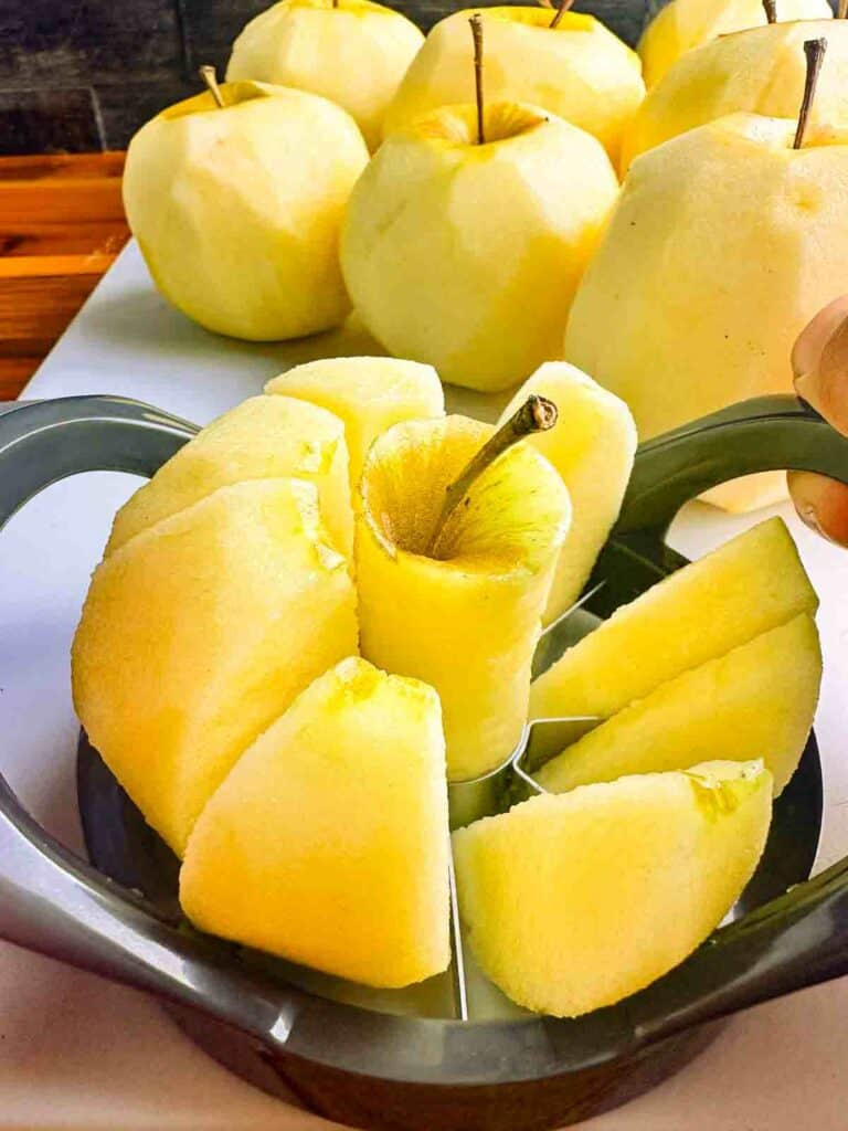 Slicing and coring an apple with an apple corer