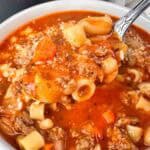 Pasta e fagioli in a white bowl.