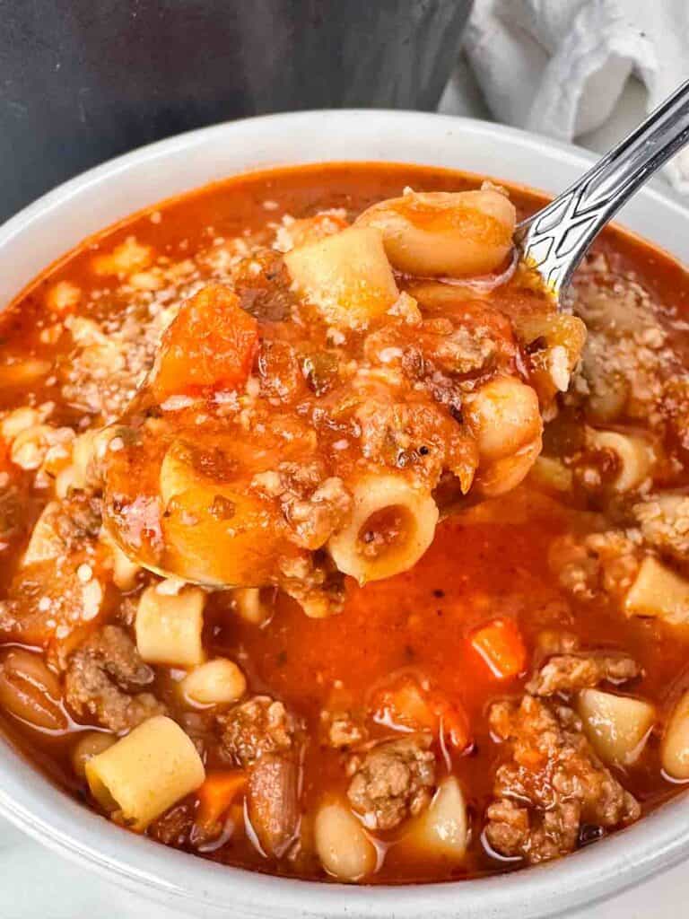 Pasta e fagioli in a white bowl.
