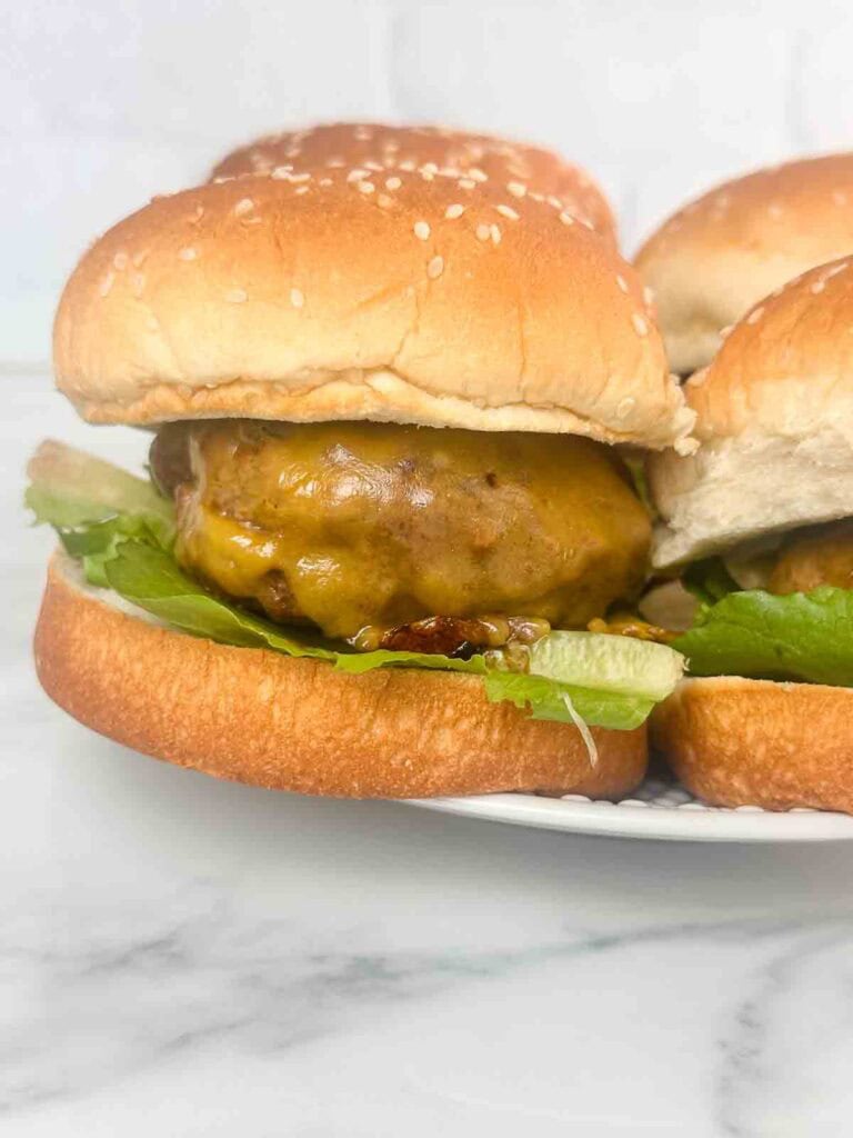 a plate of homemade cheeseburgers