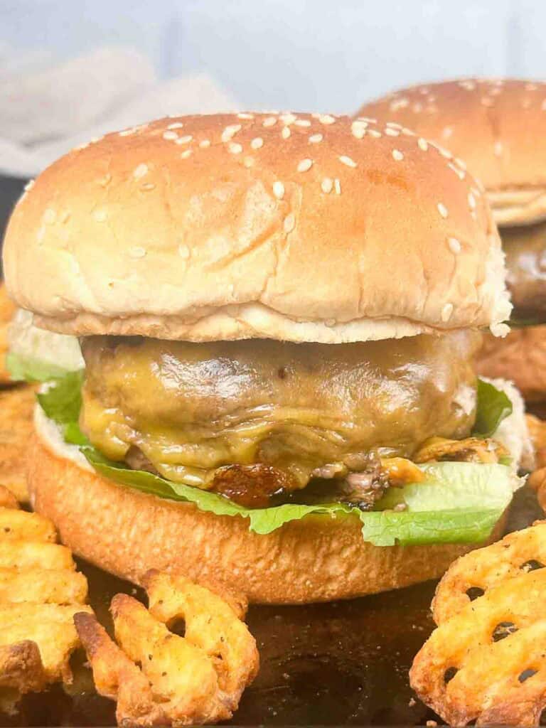 homemade cheesebugers with fries