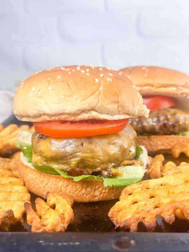 a simple burger recipe makes tasty homemade cheeseburgers shown here with fries