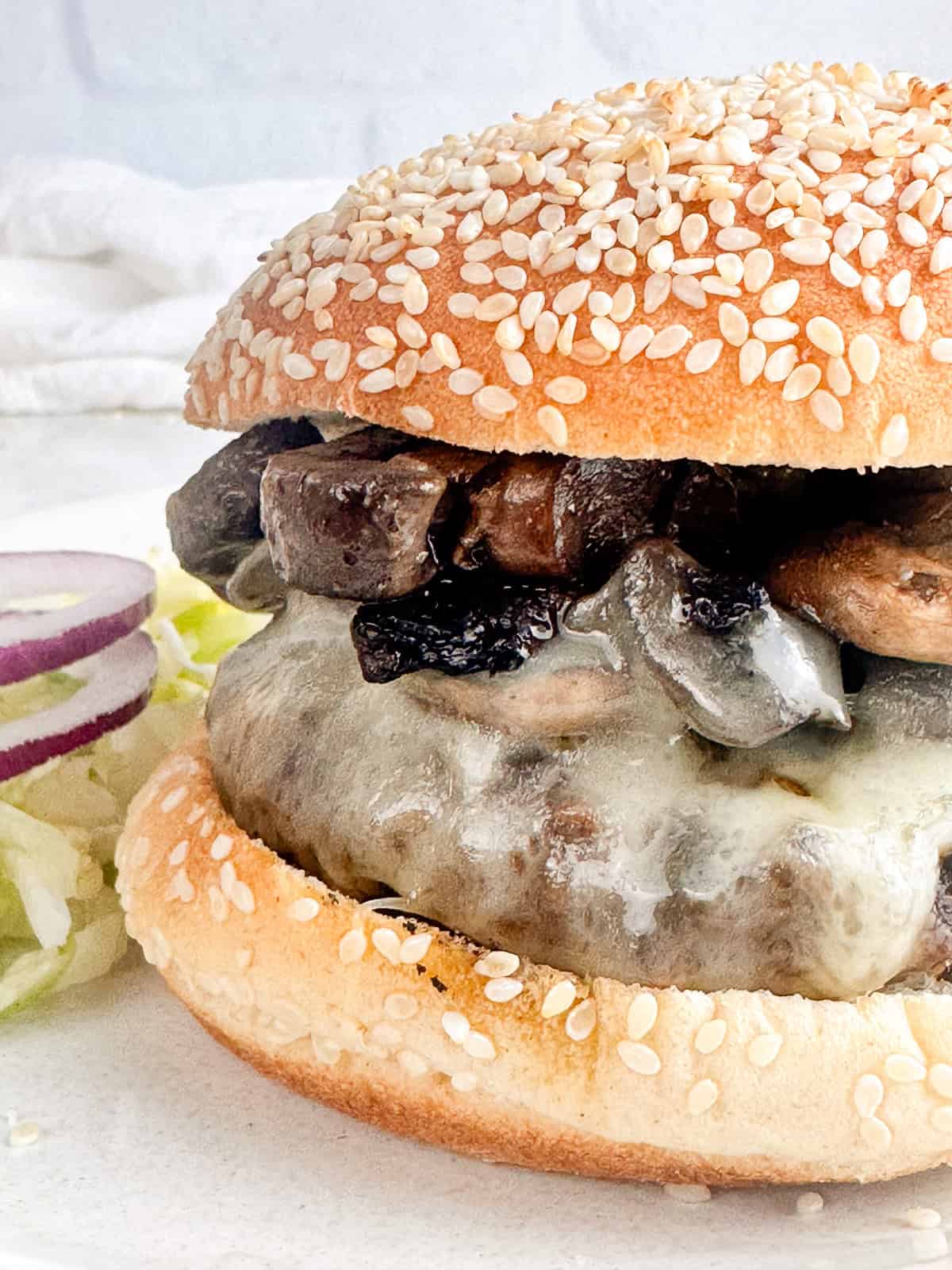 Fully assembled mushroom burger ready to serve.