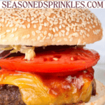 BBQ burger served on a white plate. Text reads: easy barbecue burgers, seasonedsprinkles.com